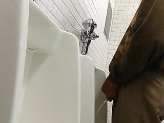 Older man getting relieving his bladder