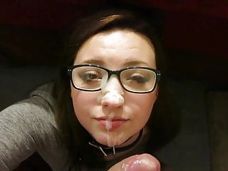 Geek girl in glasses taking facial
