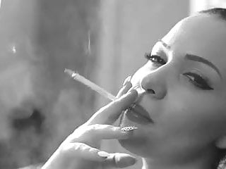sexy brunette smokes in BW