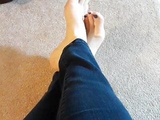 My freshly pedicured bare feet in jeans.