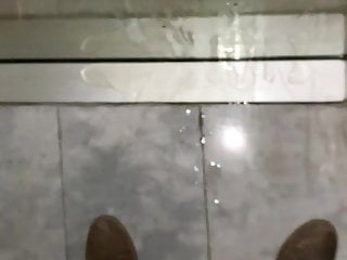 piss against window in public