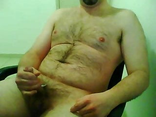 Hairy bear stroking and shooting