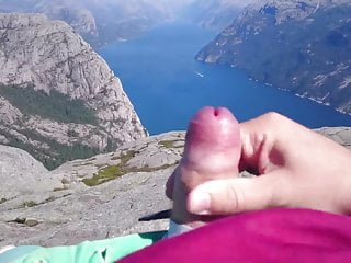 public jerking high above a fjord with windy cumshot 