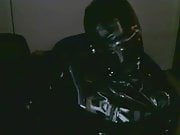 Rubber gimp in the dark