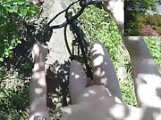 Riding and strolling naked in public nature in daylight POV