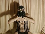 DenkffKinky - A faggot in a gas mask, with a puppy tail.