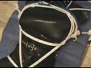 Restrained rubberslave in the hogsack - I