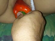 Big pepper in my wife's pussy.