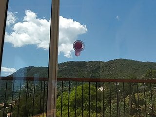 Suction cup dildo on balcony...