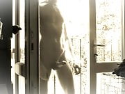 Naked in view of the neighbours