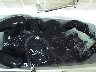 Rubber girl in the bath