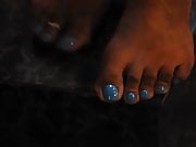 Sexy black girl with blue nails toes