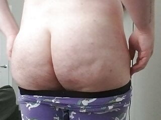 Fat boy shows off his undies...