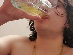 Drinking some nice yellow piss from a glass