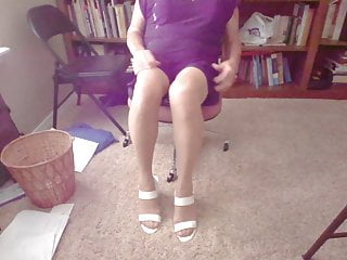 Tan nylons, white high heel sandals,...