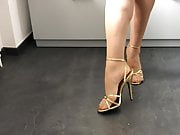 Golden Stiletto High Heels with red Nails and Stockings 