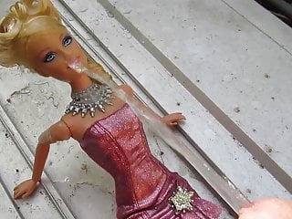 Barbie gets pissed on following cum...