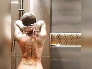 Tattood beuty showering