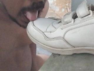 Licking shoes...