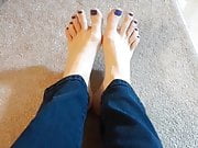 My freshly pedicured bare feet in jeans.