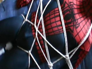 Blue and red restrained spiderman enjoying...
