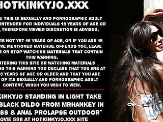  video: Hotkinkyjo standing in light take huge black dildo from mrhankey in her ass & anal prolapse outdoor
