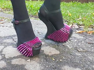 Lady L walking with exotic extreme high heels.