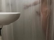 Naked twink showering