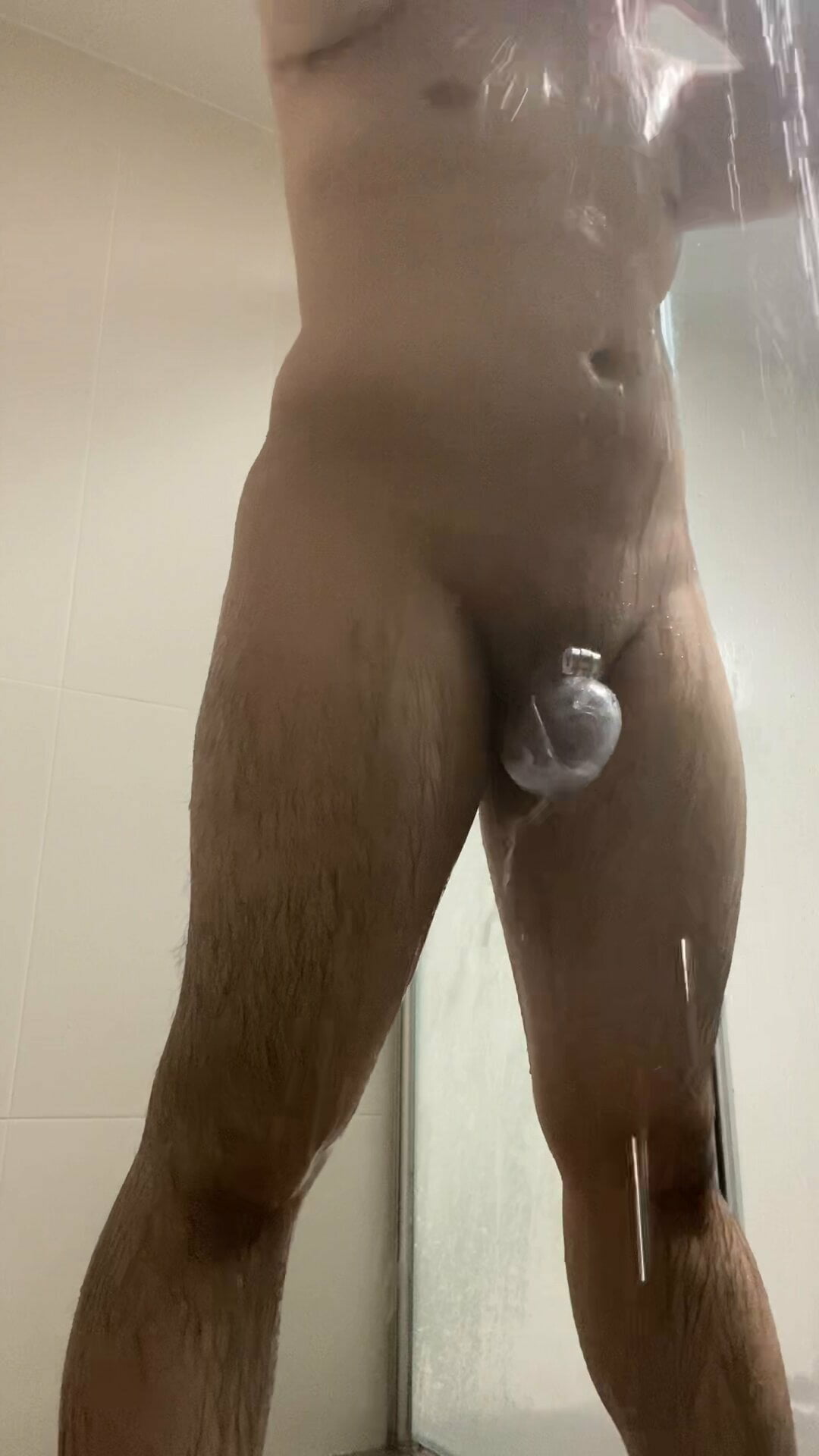 Chasity caged Korean chubby boy taking shower