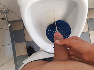 Young Student is pissing in his public school toilet