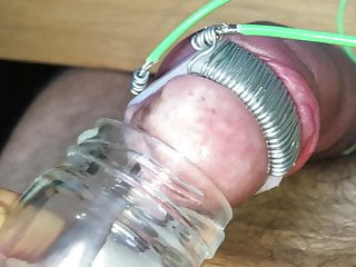 Collecting cum from my electro tortured cock