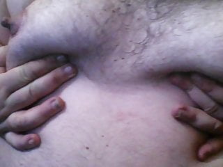 Playing with my nipples...