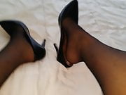 Shoeplay in stocking and well worn heels 