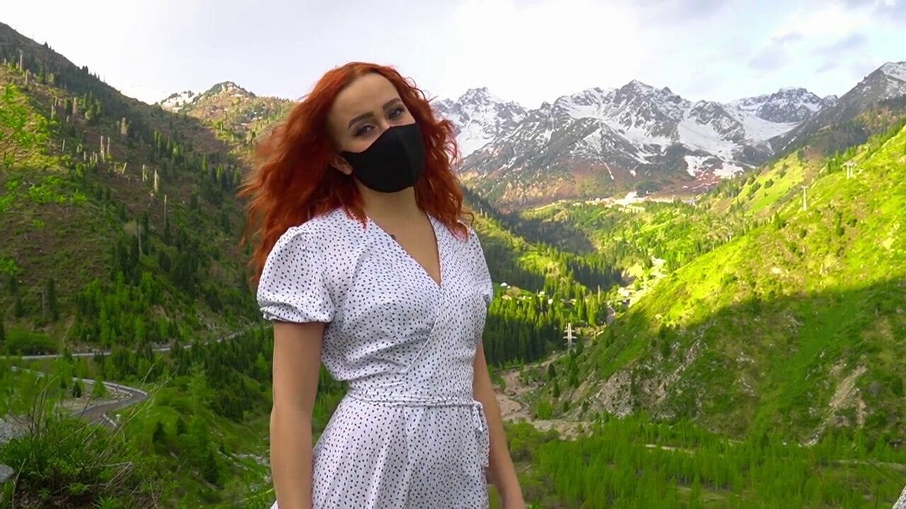 Redhead beauty shows and masturbates in nature