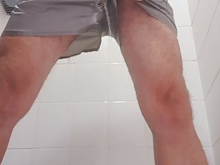 Master Ramon takes a shower and pisses in his sexy satin shorts