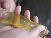 Cum into waterfilled condom under foreskin!!!