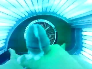 masturbating in sunbed with cumshot sun 