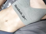 Boy in crop top and sports bra