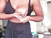 Busty Ebony using her own milk as nipple lotion